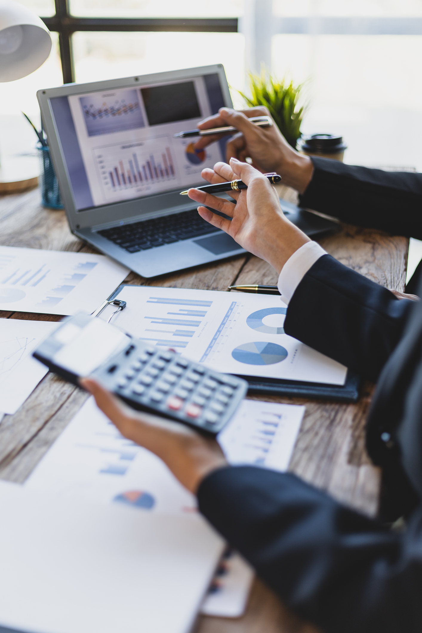 Business people meeting to discuss growth analysis of financial charts and business marketing graphs. Accounting, financial planning and investment.